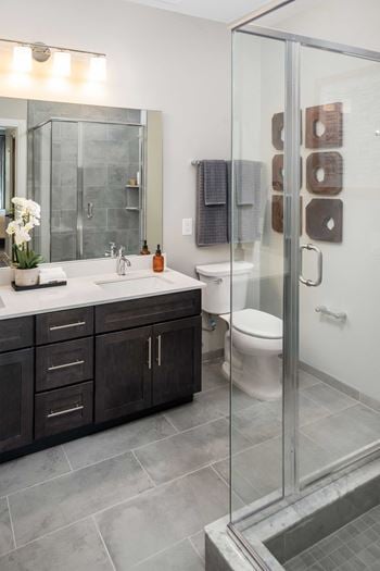 Porcelain tile flooring in bathrooms